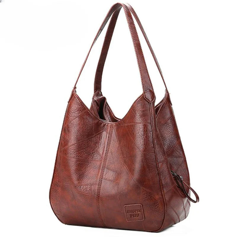Here are a few options:

- Emilia – bolso de mano vintage
- Bolso de mano vintage Emilia
- Emilia: bolso vintage de mano
- Emilia, cartera de mano vintage
- Bolso vintage de mano “Emilia”
