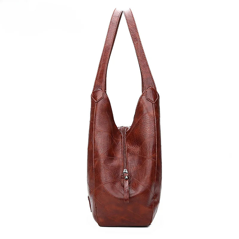 Here are a few options:

- Emilia – bolso de mano vintage
- Bolso de mano vintage Emilia
- Emilia: bolso vintage de mano
- Emilia, cartera de mano vintage
- Bolso vintage de mano “Emilia”
