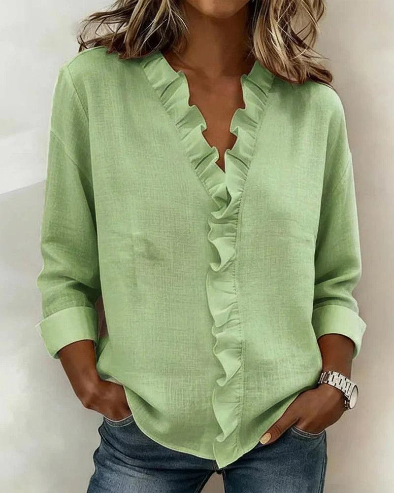 Yvonne | Blusa elegante con escote en V y volantes, mangas largas