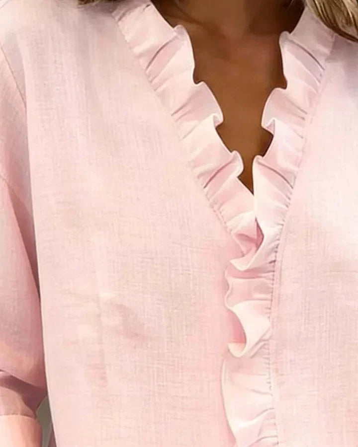 Yvonne | Blusa elegante con escote en V y volantes, mangas largas