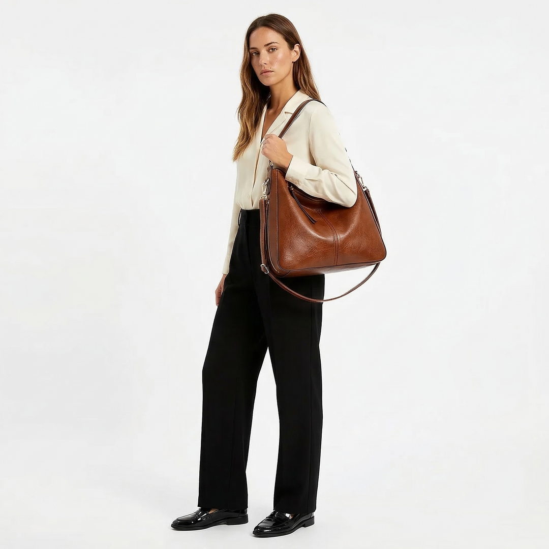 Aquí tienes opciones de título mejoradas:

- Carmela – Bolso de cuero
- Bolso de cuero Carmela
- Carmela – Bolso de cuero elegante
- Carmela – Bolso de cuero clásico
- Carmela – Bolso de cuero para mujer
- Carmela – Bolso de cuero, estilo atemporal
- Carm