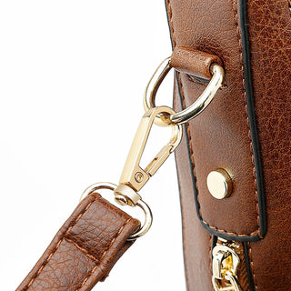 Aquí tienes opciones de título mejoradas:

- Carmela – Bolso de cuero
- Bolso de cuero Carmela
- Carmela – Bolso de cuero elegante
- Carmela – Bolso de cuero clásico
- Carmela – Bolso de cuero para mujer
- Carmela – Bolso de cuero, estilo atemporal
- Carm