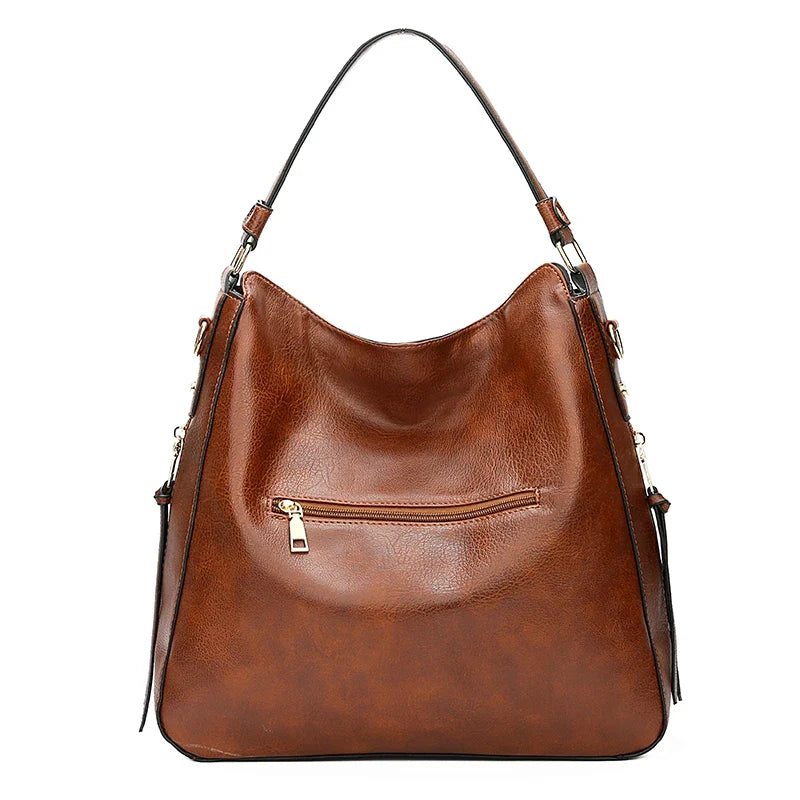 Aquí tienes opciones de título mejoradas:

- Carmela – Bolso de cuero
- Bolso de cuero Carmela
- Carmela – Bolso de cuero elegante
- Carmela – Bolso de cuero clásico
- Carmela – Bolso de cuero para mujer
- Carmela – Bolso de cuero, estilo atemporal
- Carm