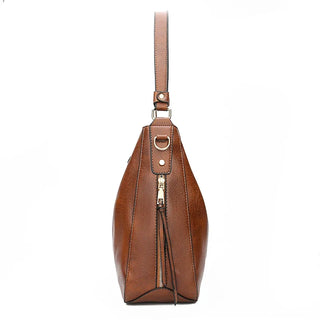Aquí tienes opciones de título mejoradas:

- Carmela – Bolso de cuero
- Bolso de cuero Carmela
- Carmela – Bolso de cuero elegante
- Carmela – Bolso de cuero clásico
- Carmela – Bolso de cuero para mujer
- Carmela – Bolso de cuero, estilo atemporal
- Carm