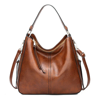 Aquí tienes opciones de título mejoradas:

- Carmela – Bolso de cuero
- Bolso de cuero Carmela
- Carmela – Bolso de cuero elegante
- Carmela – Bolso de cuero clásico
- Carmela – Bolso de cuero para mujer
- Carmela – Bolso de cuero, estilo atemporal
- Carm