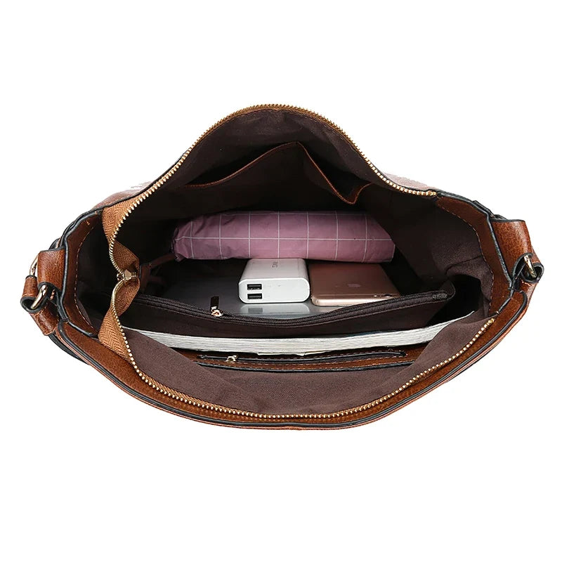 Aquí tienes opciones de título mejoradas:

- Carmela – Bolso de cuero
- Bolso de cuero Carmela
- Carmela – Bolso de cuero elegante
- Carmela – Bolso de cuero clásico
- Carmela – Bolso de cuero para mujer
- Carmela – Bolso de cuero, estilo atemporal
- Carm