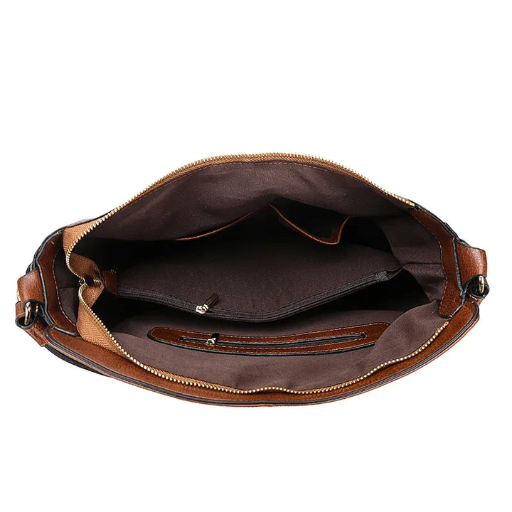 Aquí tienes opciones de título mejoradas:

- Carmela – Bolso de cuero
- Bolso de cuero Carmela
- Carmela – Bolso de cuero elegante
- Carmela – Bolso de cuero clásico
- Carmela – Bolso de cuero para mujer
- Carmela – Bolso de cuero, estilo atemporal
- Carm