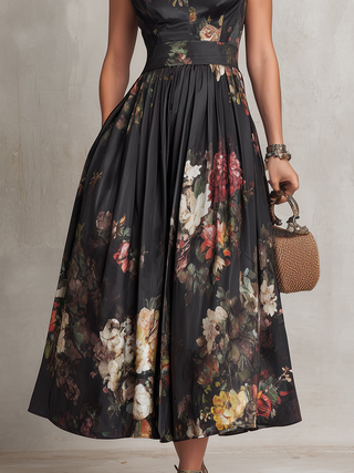 Vestido midi de satén plisado negro con escote tipo ojo de cerradura y estampado floral