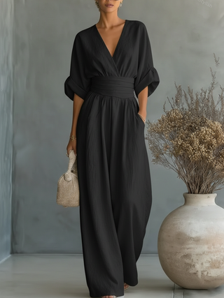 Mono elegante con escote en V y cintura alta