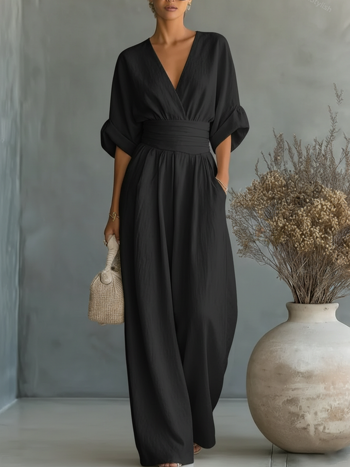 Mono elegante con escote en V y cintura alta