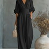 Mono elegante con escote en V y cintura alta