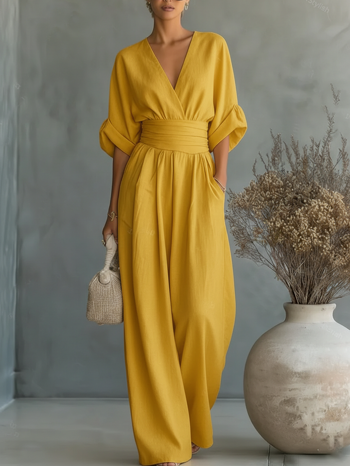 Mono elegante con escote en V y cintura alta