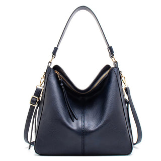 Aquí tienes opciones de título mejoradas:

- Carmela – Bolso de cuero
- Bolso de cuero Carmela
- Carmela – Bolso de cuero elegante
- Carmela – Bolso de cuero clásico
- Carmela – Bolso de cuero para mujer
- Carmela – Bolso de cuero, estilo atemporal
- Carm