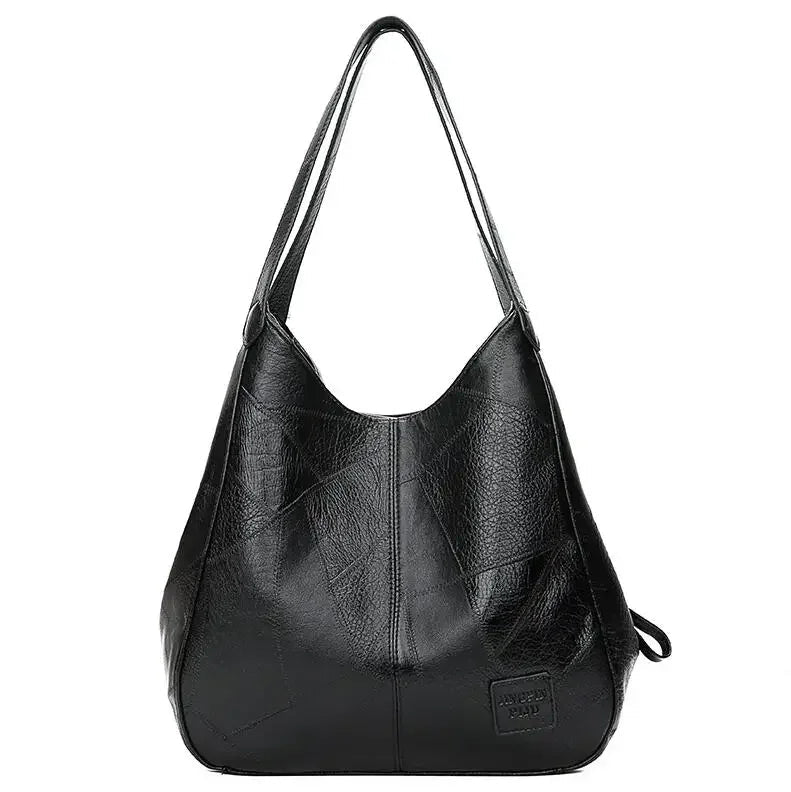 Here are a few options:

- Emilia – bolso de mano vintage
- Bolso de mano vintage Emilia
- Emilia: bolso vintage de mano
- Emilia, cartera de mano vintage
- Bolso vintage de mano “Emilia”