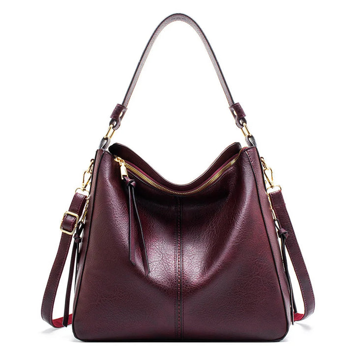 Aquí tienes opciones de título mejoradas:

- Carmela – Bolso de cuero
- Bolso de cuero Carmela
- Carmela – Bolso de cuero elegante
- Carmela – Bolso de cuero clásico
- Carmela – Bolso de cuero para mujer
- Carmela – Bolso de cuero, estilo atemporal
- Carm