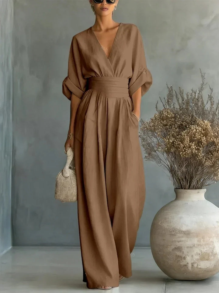 Mono elegante con escote en V y cintura alta