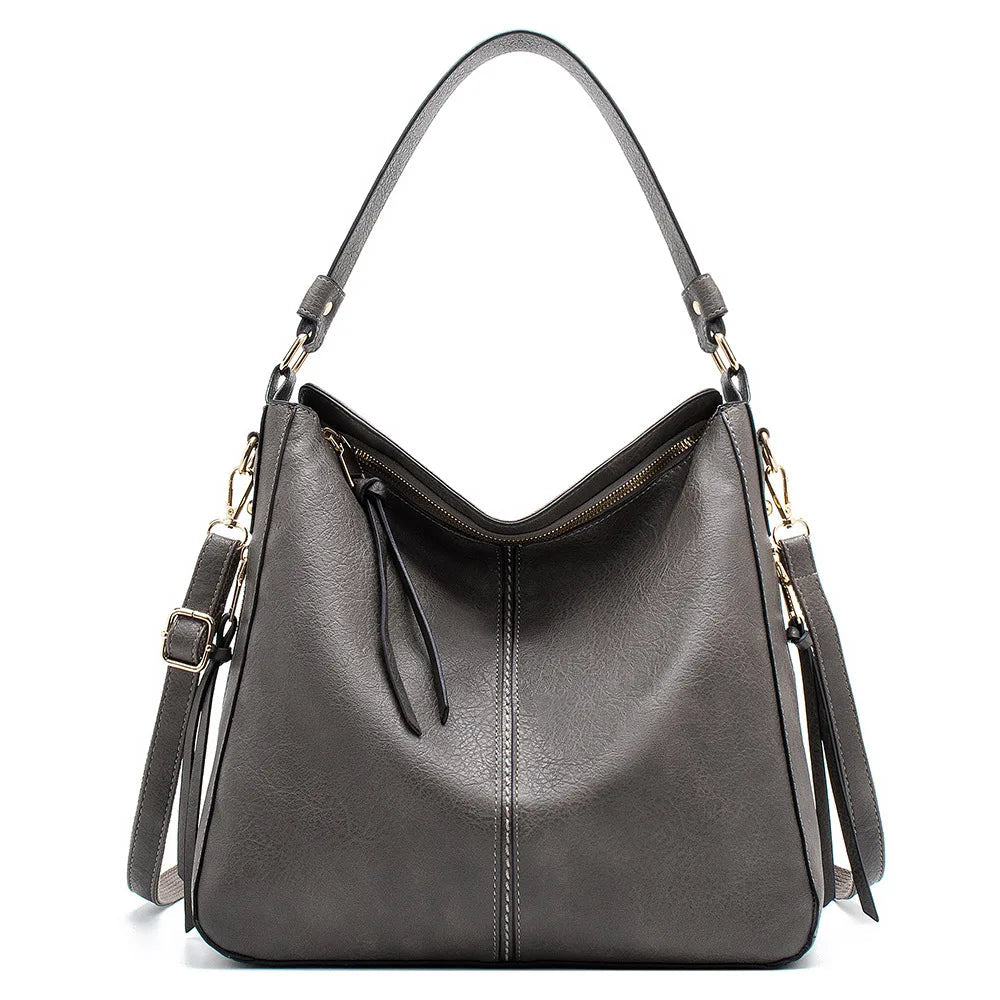 Aquí tienes opciones de título mejoradas:

- Carmela – Bolso de cuero
- Bolso de cuero Carmela
- Carmela – Bolso de cuero elegante
- Carmela – Bolso de cuero clásico
- Carmela – Bolso de cuero para mujer
- Carmela – Bolso de cuero, estilo atemporal
- Carm