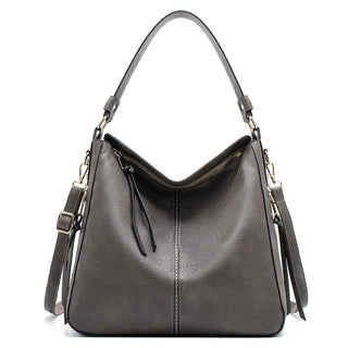 Aquí tienes opciones de título mejoradas:

- Carmela – Bolso de cuero
- Bolso de cuero Carmela
- Carmela – Bolso de cuero elegante
- Carmela – Bolso de cuero clásico
- Carmela – Bolso de cuero para mujer
- Carmela – Bolso de cuero, estilo atemporal
- Carm