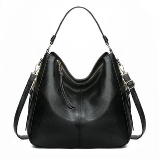 Aquí tienes opciones de título mejoradas:

- Carmela – Bolso de cuero
- Bolso de cuero Carmela
- Carmela – Bolso de cuero elegante
- Carmela – Bolso de cuero clásico
- Carmela – Bolso de cuero para mujer
- Carmela – Bolso de cuero, estilo atemporal
- Carm