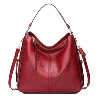 Aquí tienes opciones de título mejoradas:

- Carmela – Bolso de cuero
- Bolso de cuero Carmela
- Carmela – Bolso de cuero elegante
- Carmela – Bolso de cuero clásico
- Carmela – Bolso de cuero para mujer
- Carmela – Bolso de cuero, estilo atemporal
- Carm