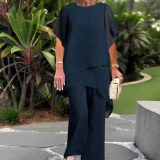 Conjunto compuesto por un top irregular fascinante y pantalones de pierna ancha