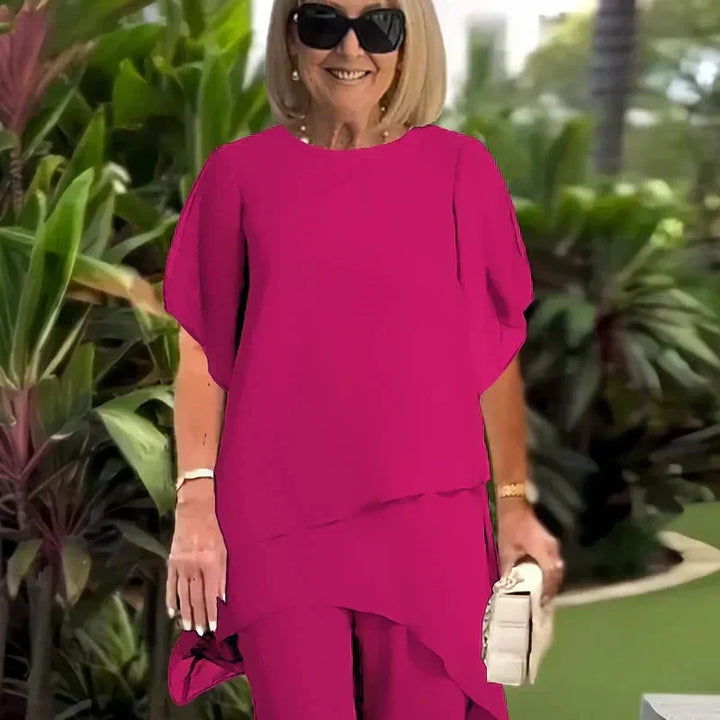 Conjunto compuesto por un top irregular fascinante y pantalones de pierna ancha