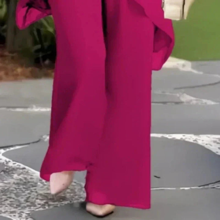 Conjunto compuesto por un top irregular fascinante y pantalones de pierna ancha