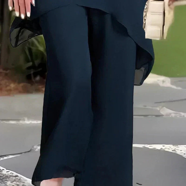 Conjunto compuesto por un top irregular fascinante y pantalones de pierna ancha
