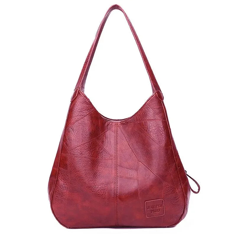 Here are a few options:

- Emilia – bolso de mano vintage
- Bolso de mano vintage Emilia
- Emilia: bolso vintage de mano
- Emilia, cartera de mano vintage
- Bolso vintage de mano “Emilia”